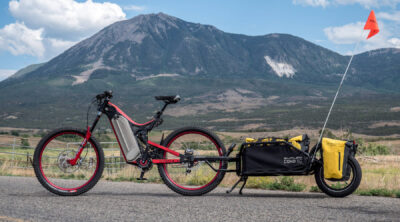An optibike with a trailer for long range touring