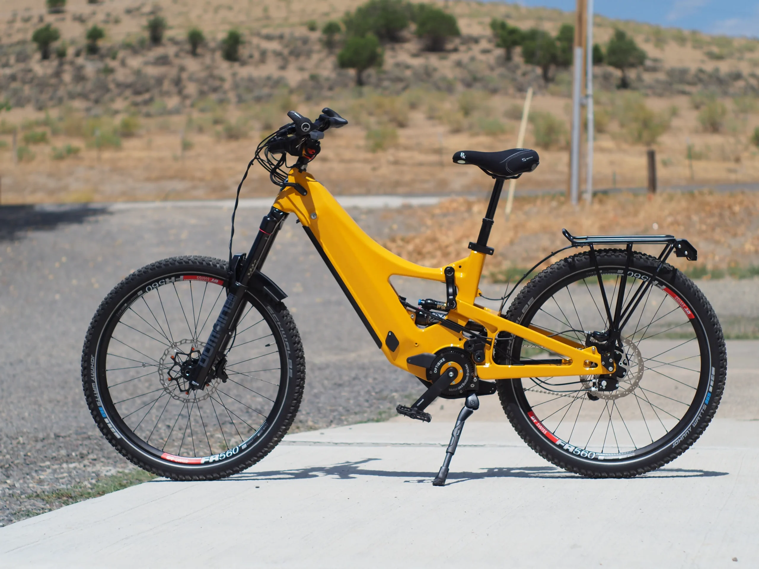 Yellow electric mountain bike on rural road