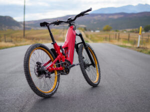 Red mountain bike on country road